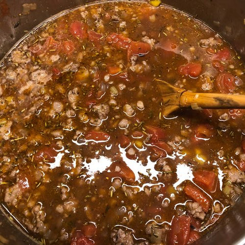 SAUSAGE RAGU WITH WILTED GREENS