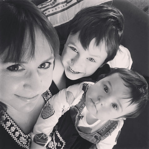 Karen founder of Growth Spurtz with her two young children black and white photograph u