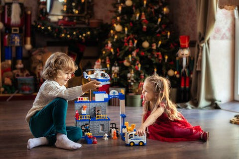 Unisex children play with christmas toys