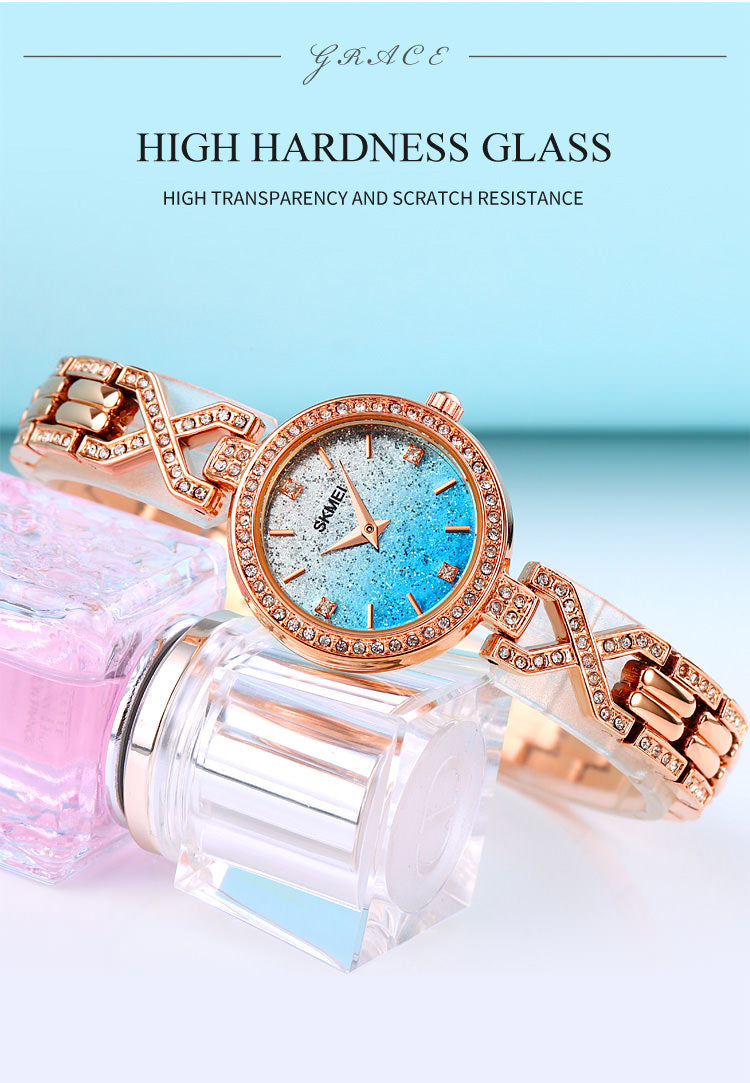 SKMEI 2001 Reloj de pulsera romántico ultrafino con diamantes de imitación para mujer