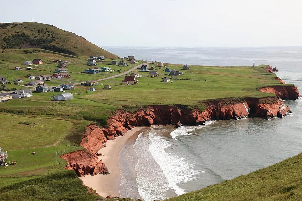 The south coast of the village of Havre-aux-Maisons with its small Cap-Alright lighthouse in the Îles-De-La-Madeleine.