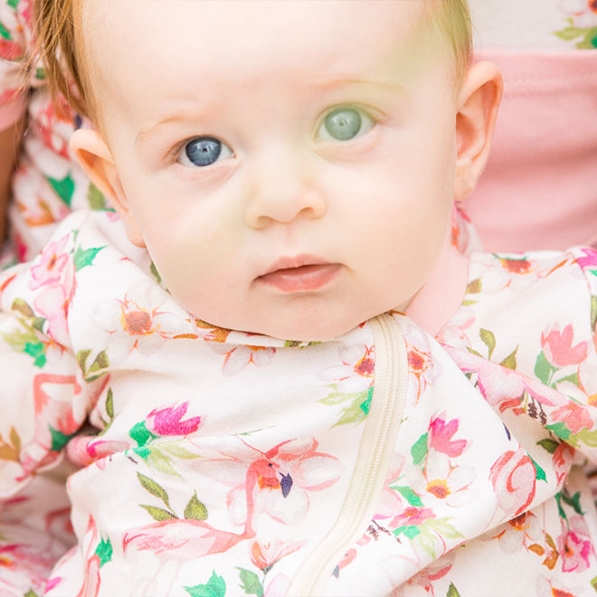 Close-up of a baby wearing pajamas.