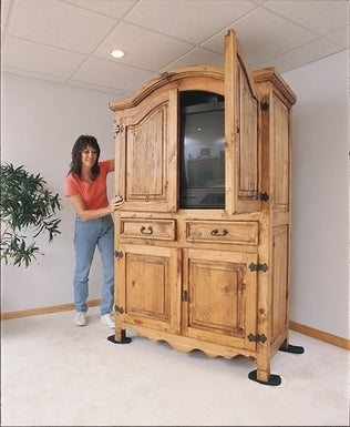 woman using EZ Move Furniture Slides to easily move heavy furniture  