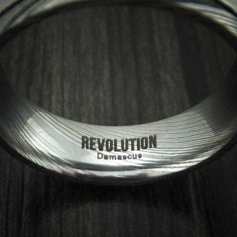 Damascus Steel Ring with Revolution Logo and Material Mark