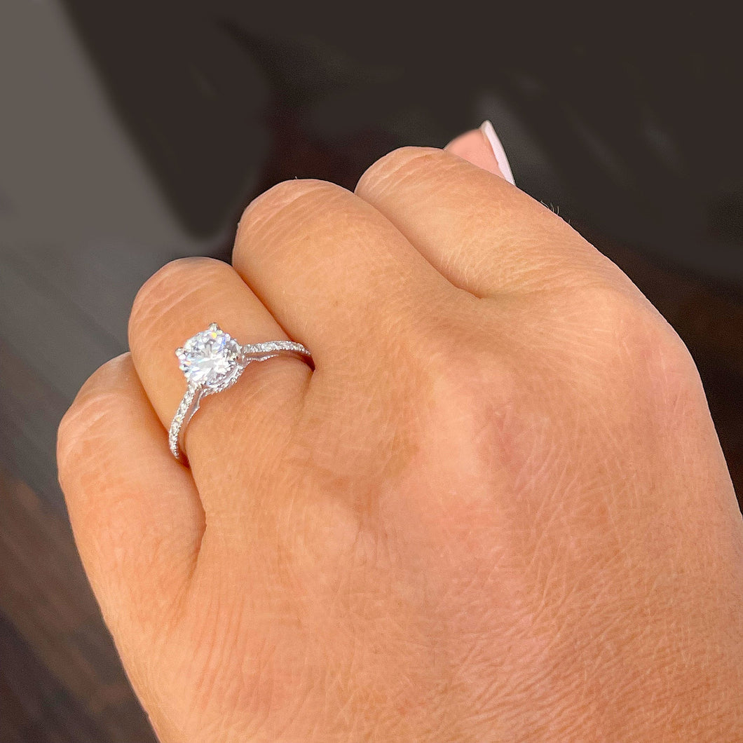 1.35 carat diamond ring on finger