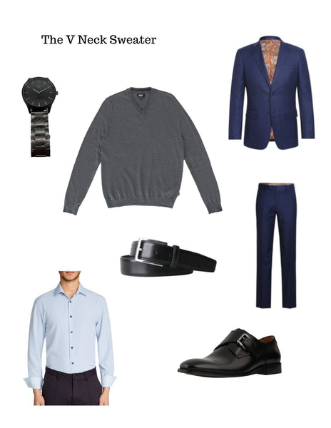 Navy plaid suit, charcoal v neck sweater,  light blue dress shirt, black leather monk strap dress  shoes, black leather belt, black steel watch