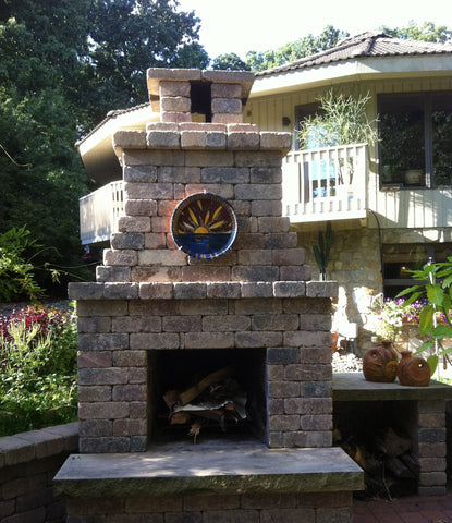 Outdoor Fireplace with custom made mosaic