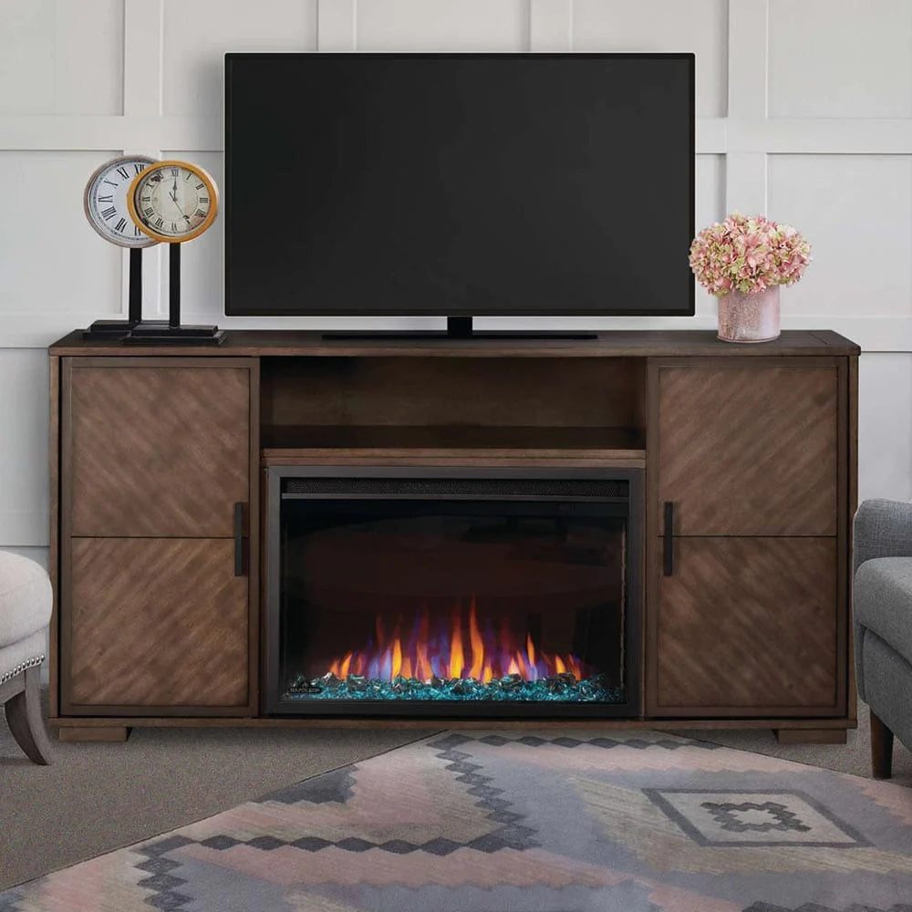 TV console electric fireplace with chevron cabinet doors and TV on top.