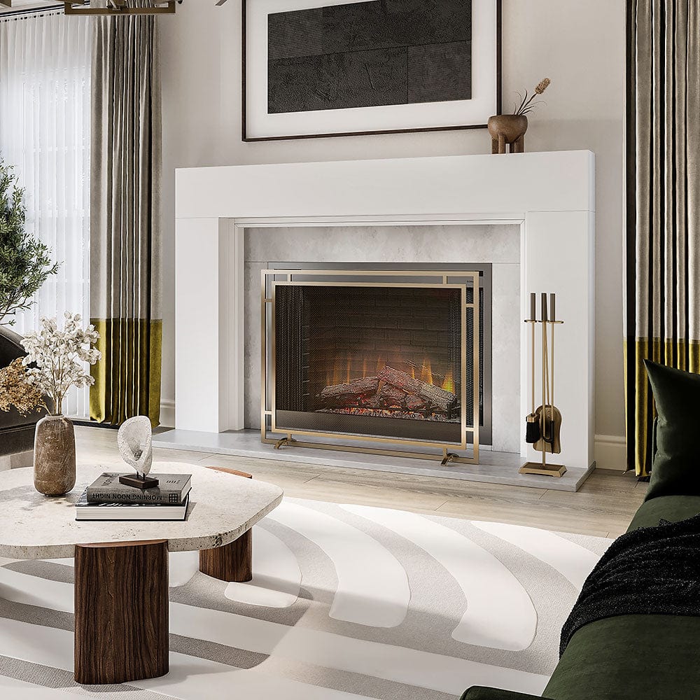 Fireplace with full surround mantel in white with brass screen and brass fireplace tools.