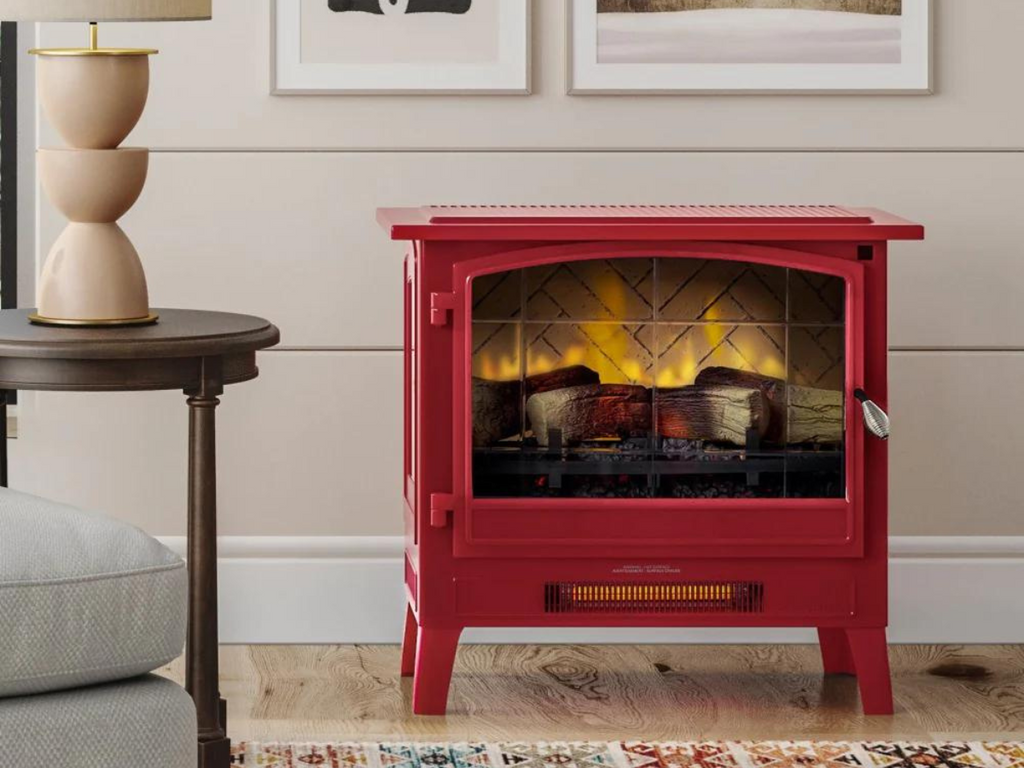 Red electric fireplace stove in a neutral colored living room.