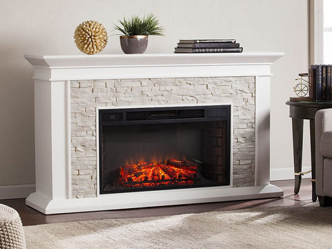 Wide white electric fireplace with wood mantel and stacked stone surround.