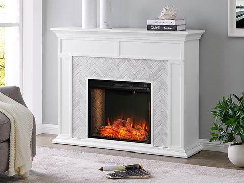 White mantel and marble surround on an electric fireplace in a minimal living room.