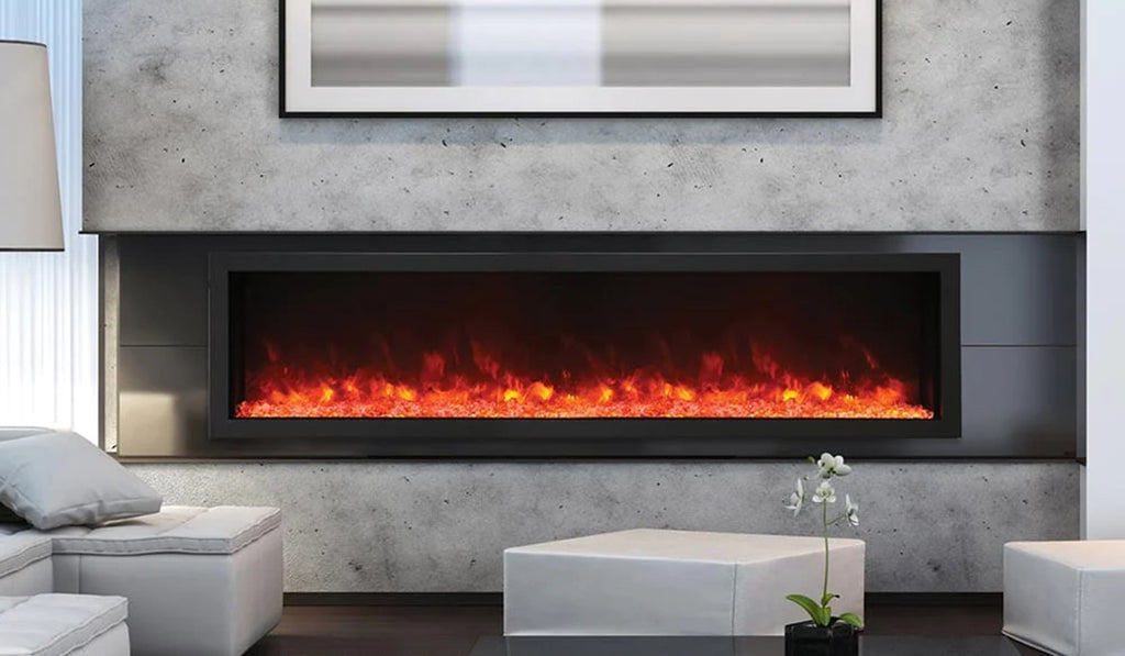 Large linear electric fireplace with gray stone accents in a living room.