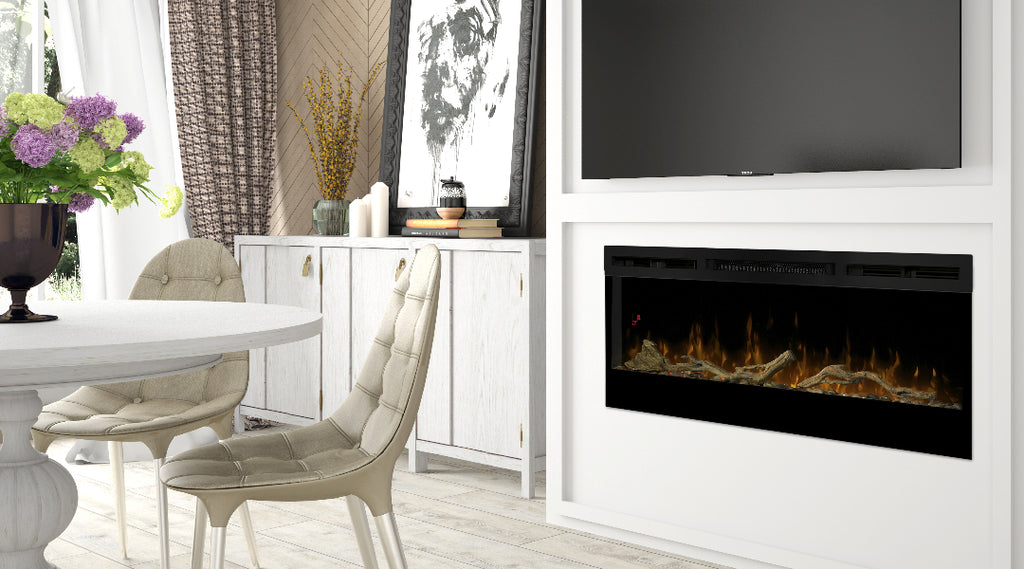 Linear electric fireplace in a white wall beneath a TV.