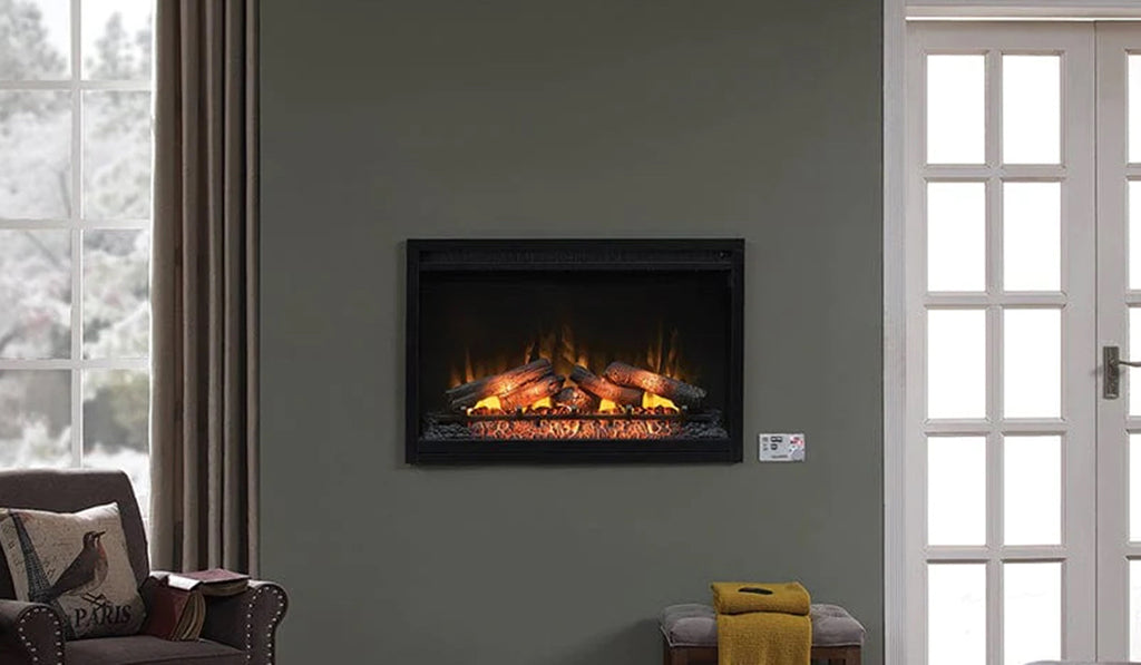 Electric fireplace in a gray surround with no mantel in a living room.