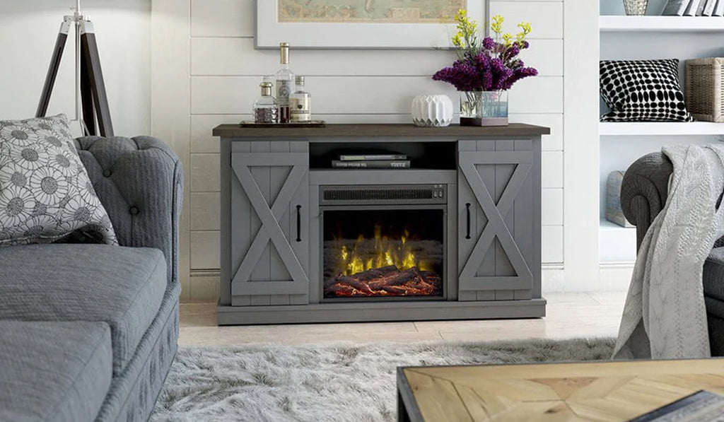 Gray barn door fireplace console with electric fireplace.