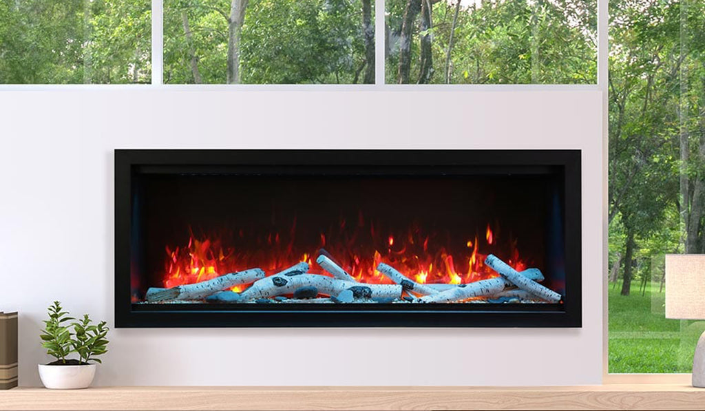 Linear electric fireplace in an outdoor setting with birch logs and realistic flames.