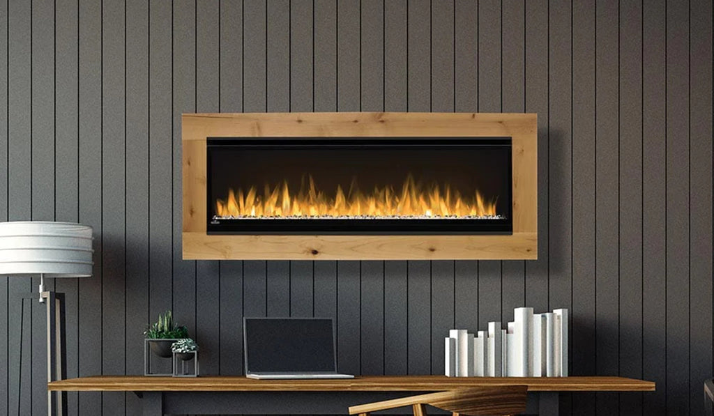 Linear electric fireplace in a gray plank wall with console beneath.