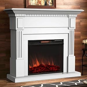 Traditional wood mantel and surround with electric fireplace against a wood paneled wall.