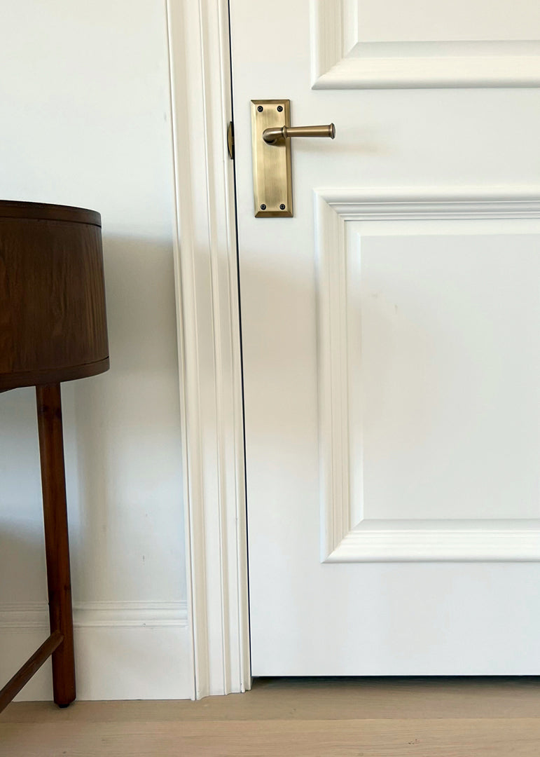 brass interior luxury door hardware white door