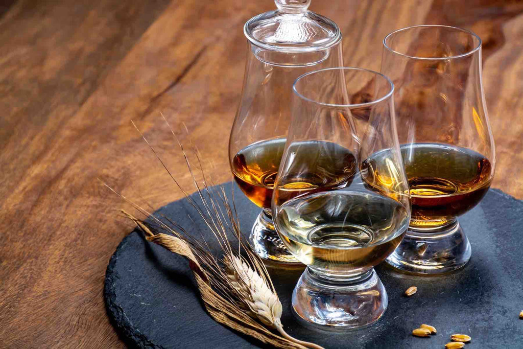 What main ingredients is bourbon or scotch made from?