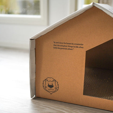 "A cat's love for boxes is a reminder that the simplest things in life often hold the greatest allure." - Leo's Paw Recycled Cat Scratching House