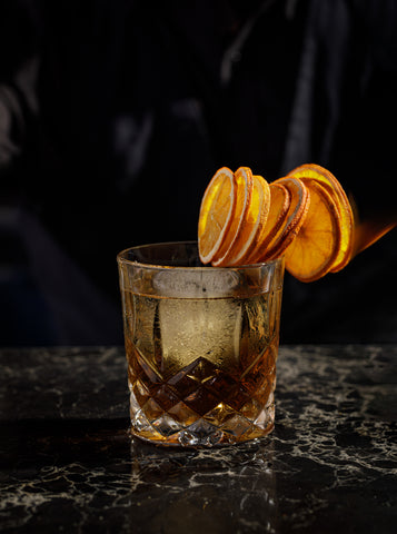 'Old Fashioned' Cocktail garnished with Silver Tongue Foods dried Orange Slices 