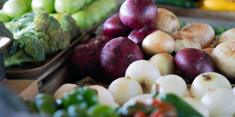 Root veg on display on shelves