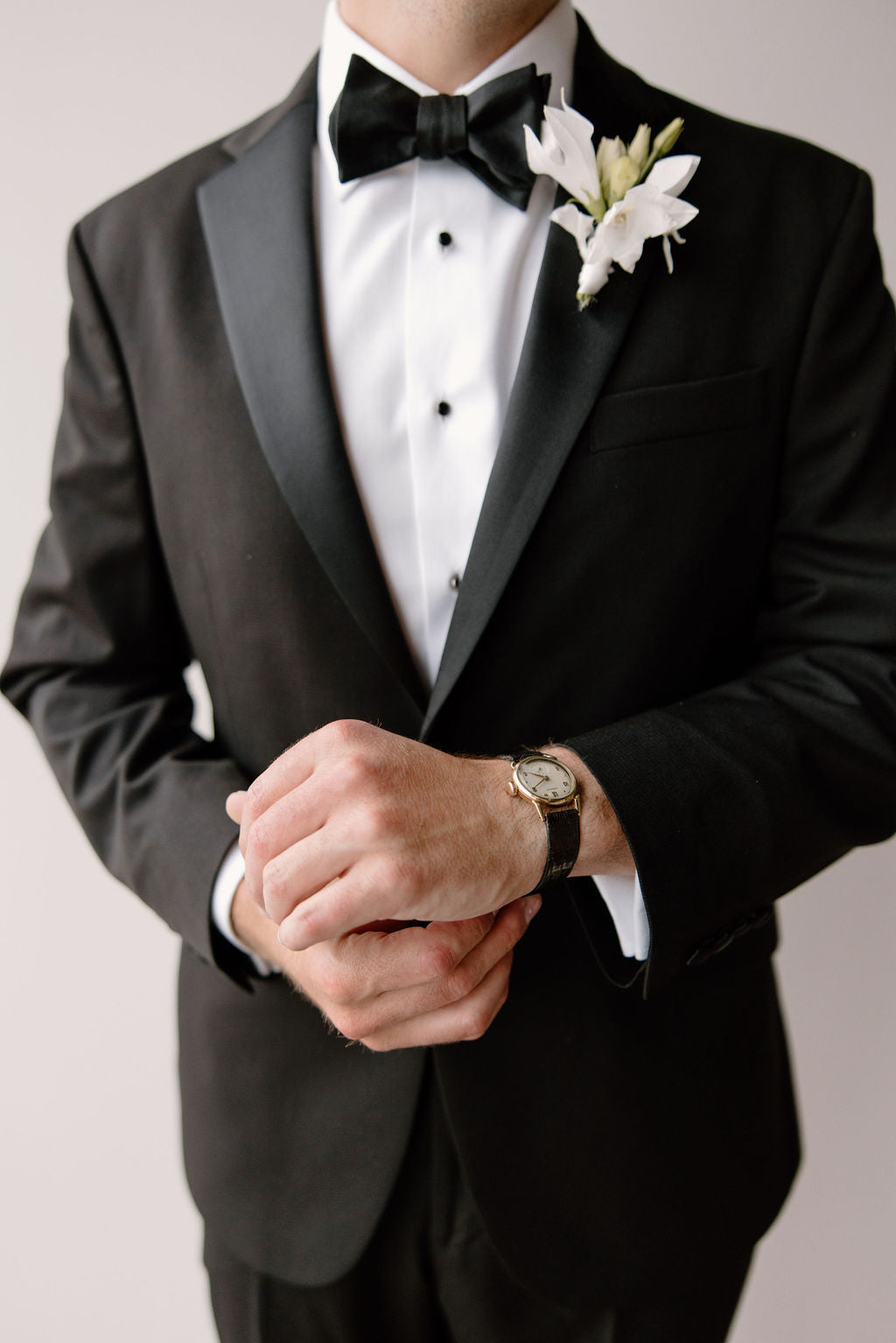 Boutonniere on groom by Earth and Thorn floral studio