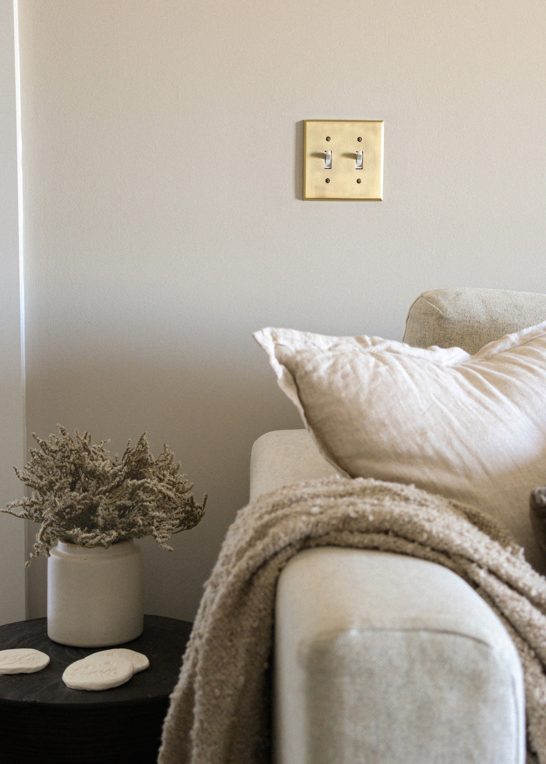 classy vintage living room with antique brass switch plate from nostalgic warehouse