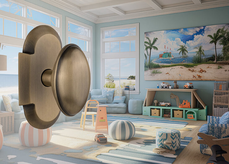 A whimsical beach themed children's playroom with a Nostalgic Warehouse Cottage Short Plate with Homestead Knob in Antique Brass laid over the top of the image on the left.