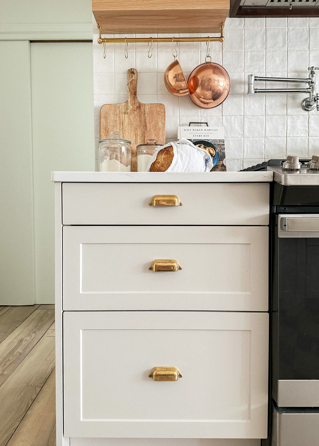 michelle milowe white kitchen cabinets unlacquered brass cabinet hardware nostalgic warehouse