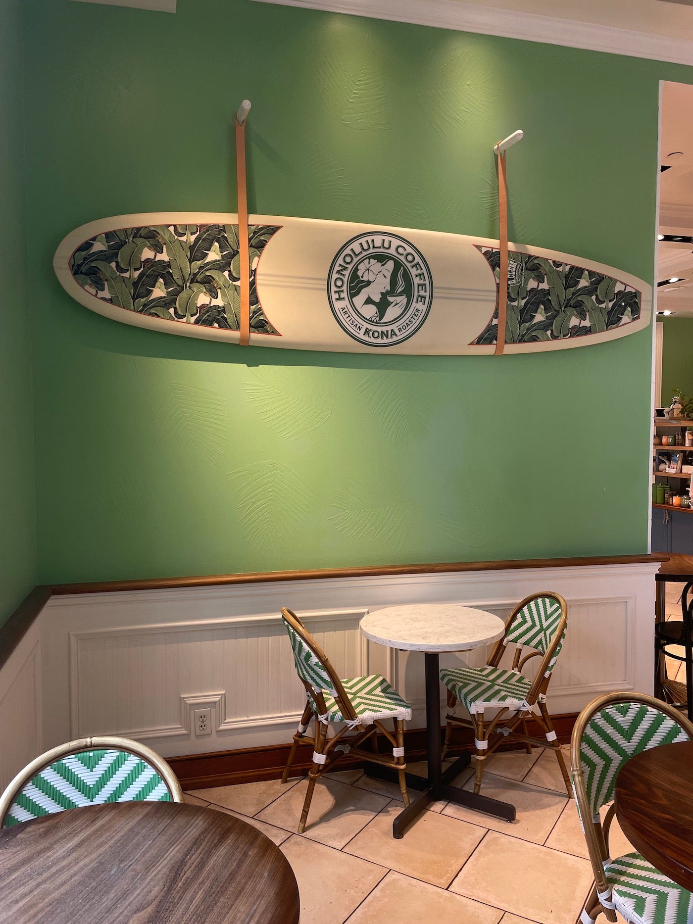 The custom surfboard inside the Moana Surfrider hotel