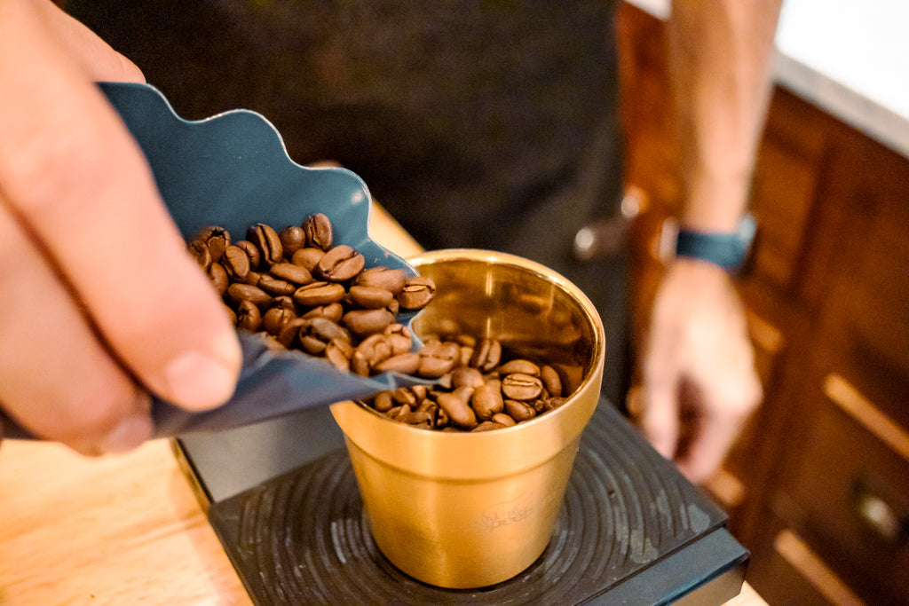 Weighing out coffee beans to grind with the French Press.