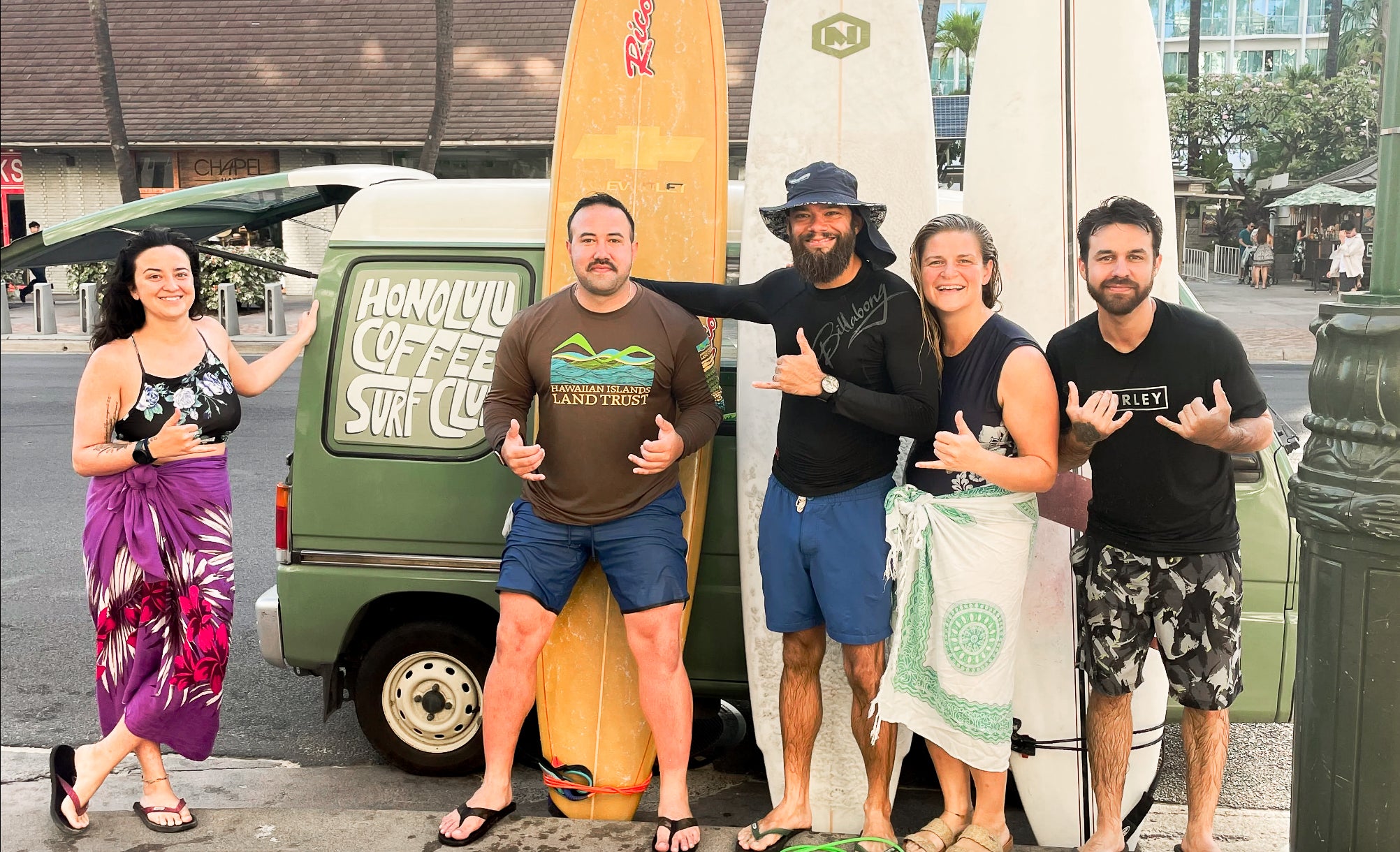 Members of the Honolulu Coffee leadership team in front of the Sue Brew