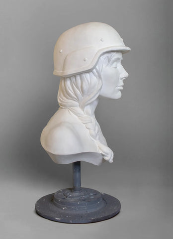 Sculpture bust of artist Leigh Brooklyn wearing military helmet