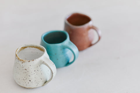 Three mugs from Lunio by Sofie, showcasing the handles.