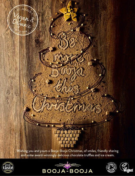 Booja-Booja advertisement on back page of Vegan Food & Living magazine, December 2020, featuring a Christmas tree made from cocoa powder with the headline: Be more Booja this Christmas