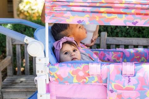 Chrissy Teigen wagon flowers stroller