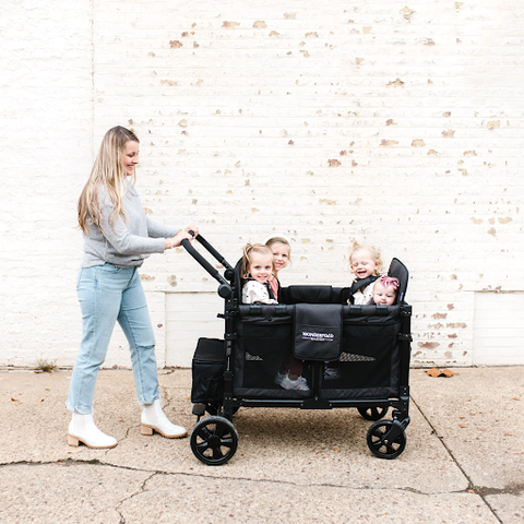 4 seat stroller with increased weight limit to accommodate varying age groups