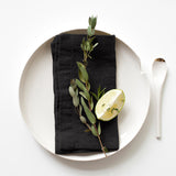 Black napkin on a plate