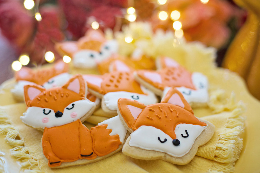 Cookies painted to look like sleepy fall foxes