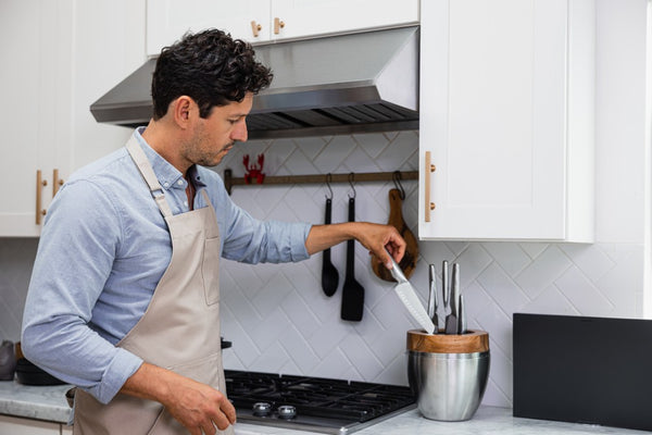 Man taking out a Japanese kitchen knife