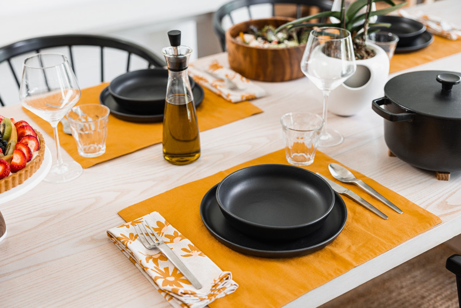 Place setting with golden yellow and black accents