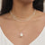 Layered pearl necklaces