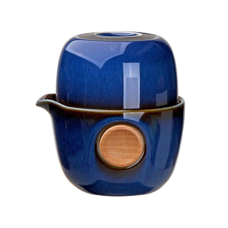 https://cdn.shopify.com/s/files/1/0430/0328/1574/products/teapot-set-for-one-quicker-tasting-4oz-blue_460x@2x.jpg?v=1650017311