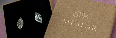 Silver leaf earrings in a jewellery box