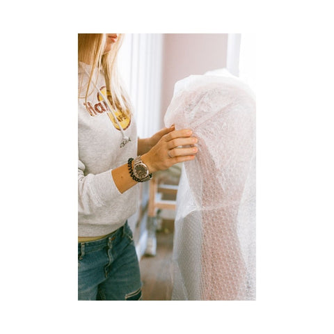 Girl holding bubble wrap