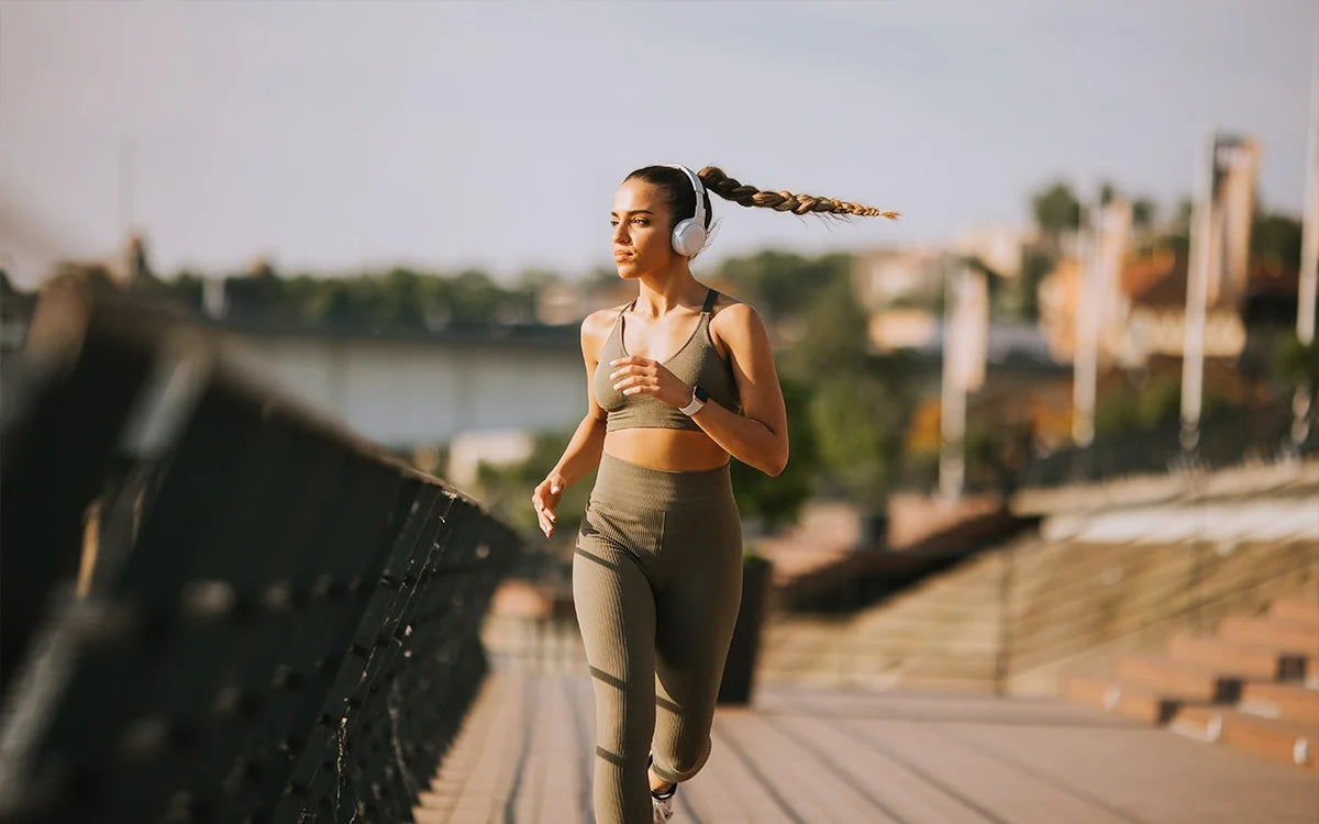 Girl Running Wearing Headphones