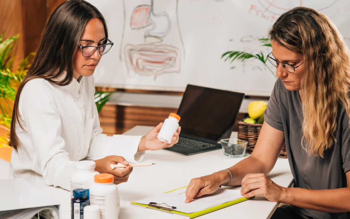 Two Nutritionists Reviewing Supplements